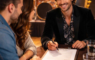 Signing a Wedding Band Contract