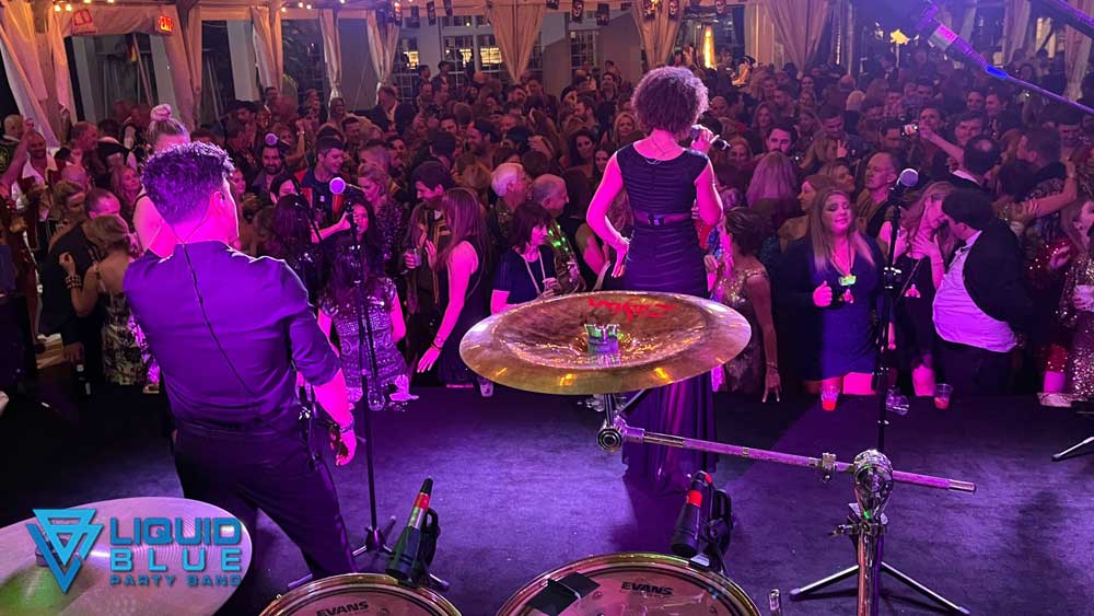 Liquid Blue Wedding Band Entertaining Guests at a Wedding Reception